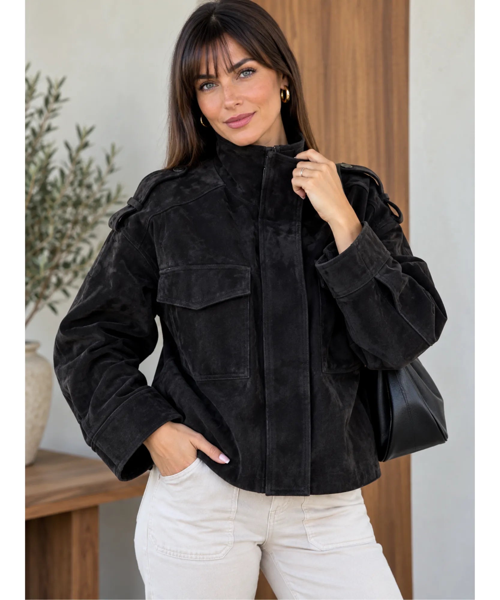Women's suede bomber jacket in charcoal, casual outfit with a black bag