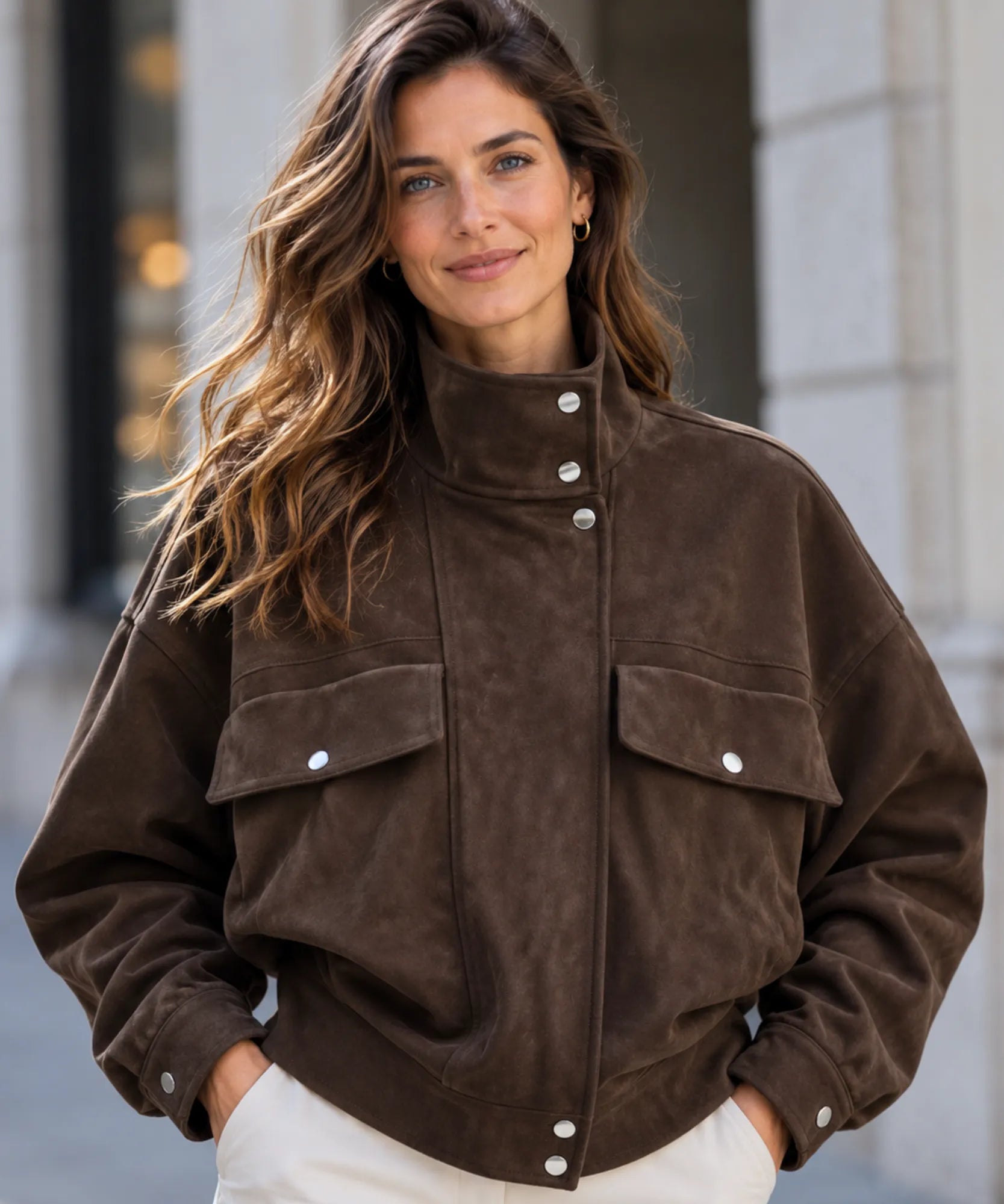 Women's brown suede jacket with funnel neck, front view