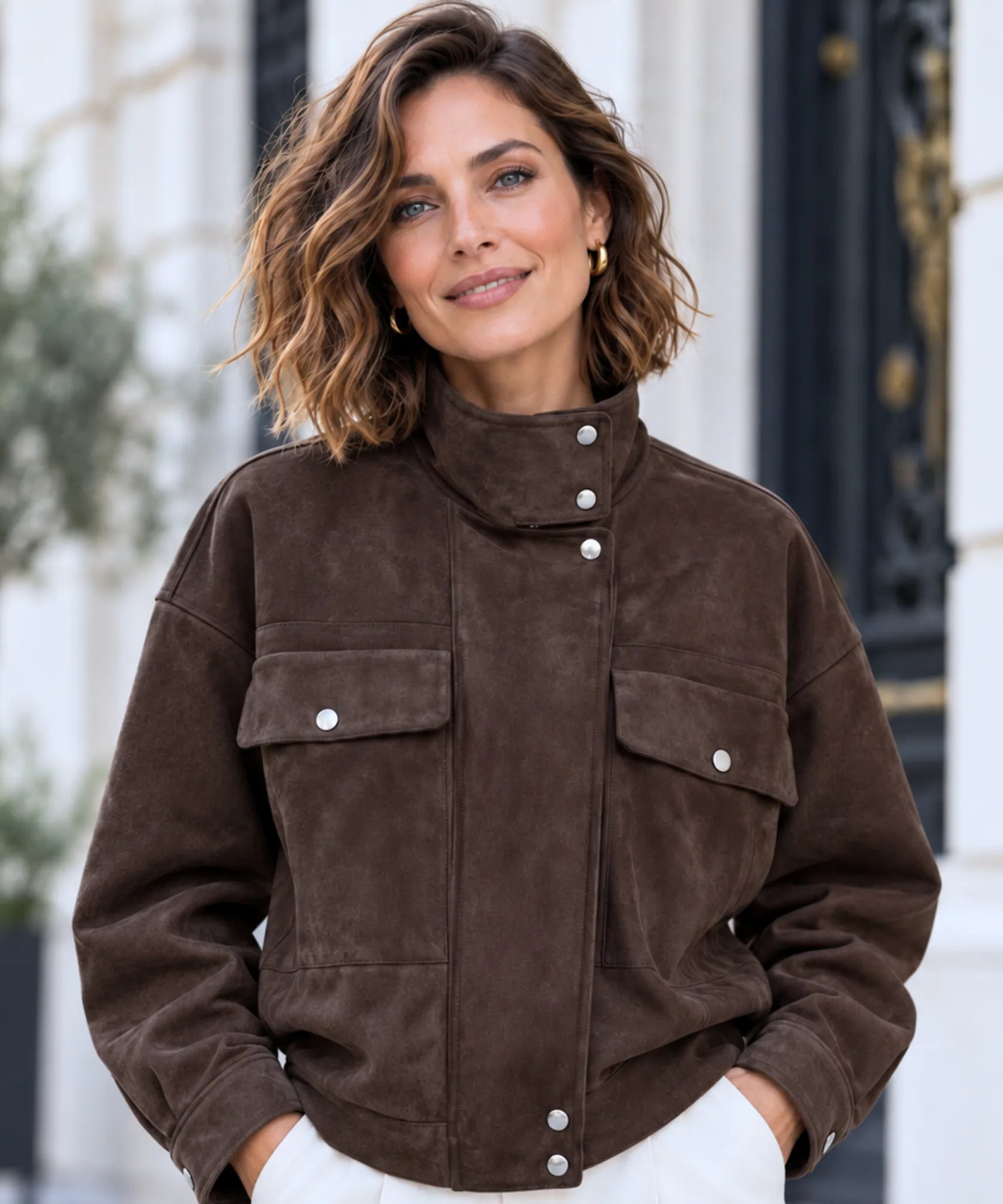 Women's brown suede jacket with funnel neck and snap flap pockets