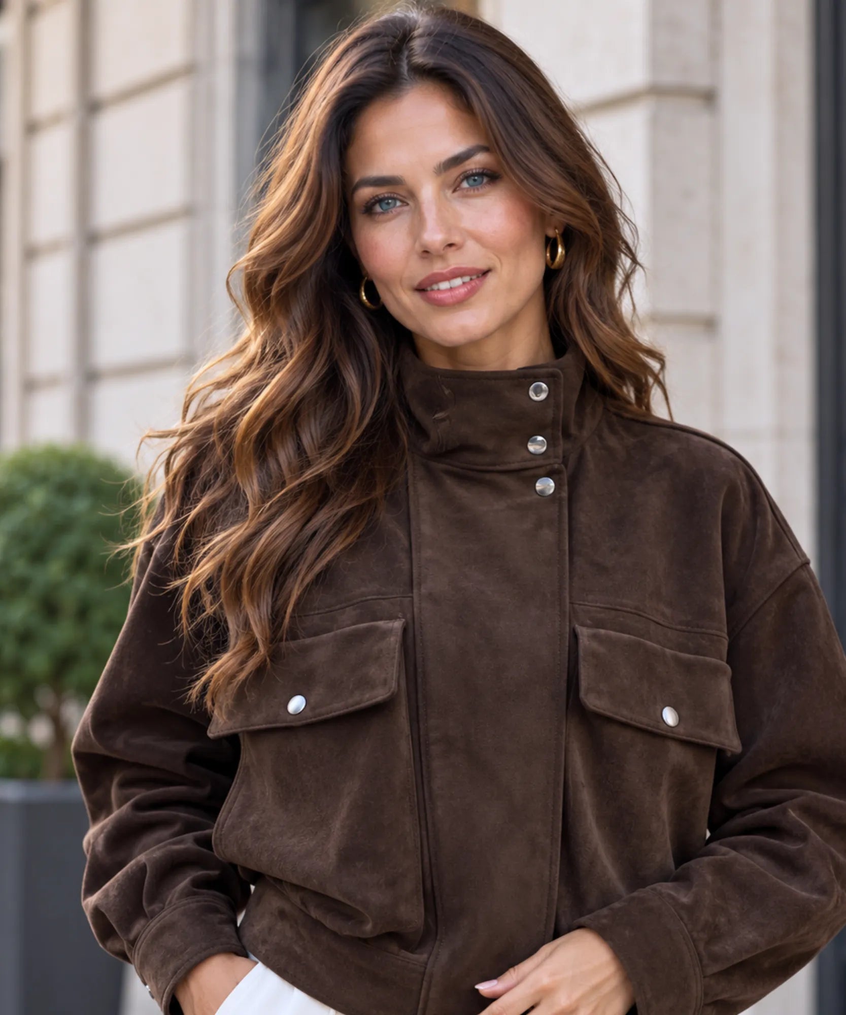 Women's brown suede jacket styled for fall and winter