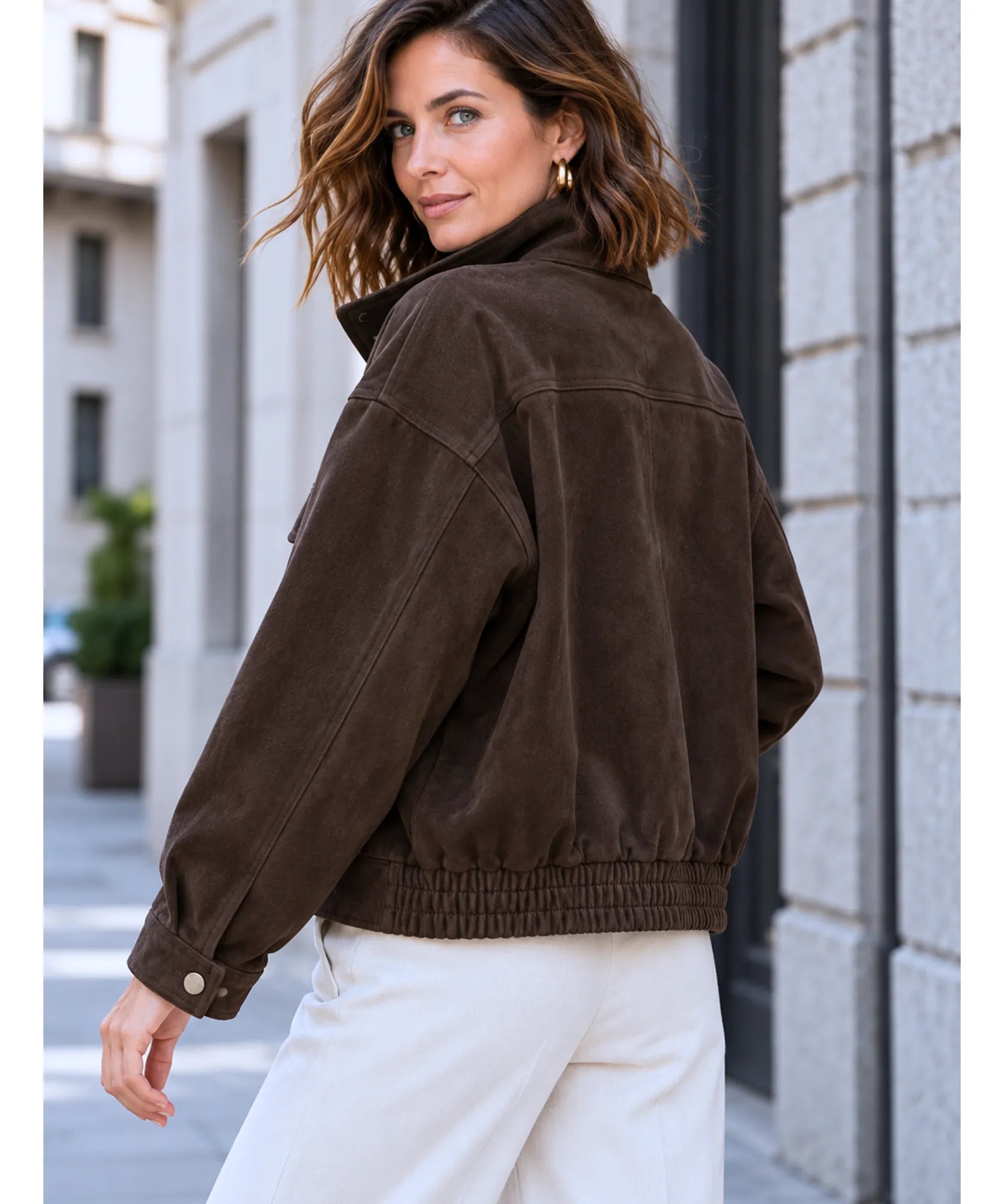 Women's brown suede jacket, back view with elastic hem