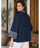 Women's navy denim kimono jacket, back view with contrast cuffs