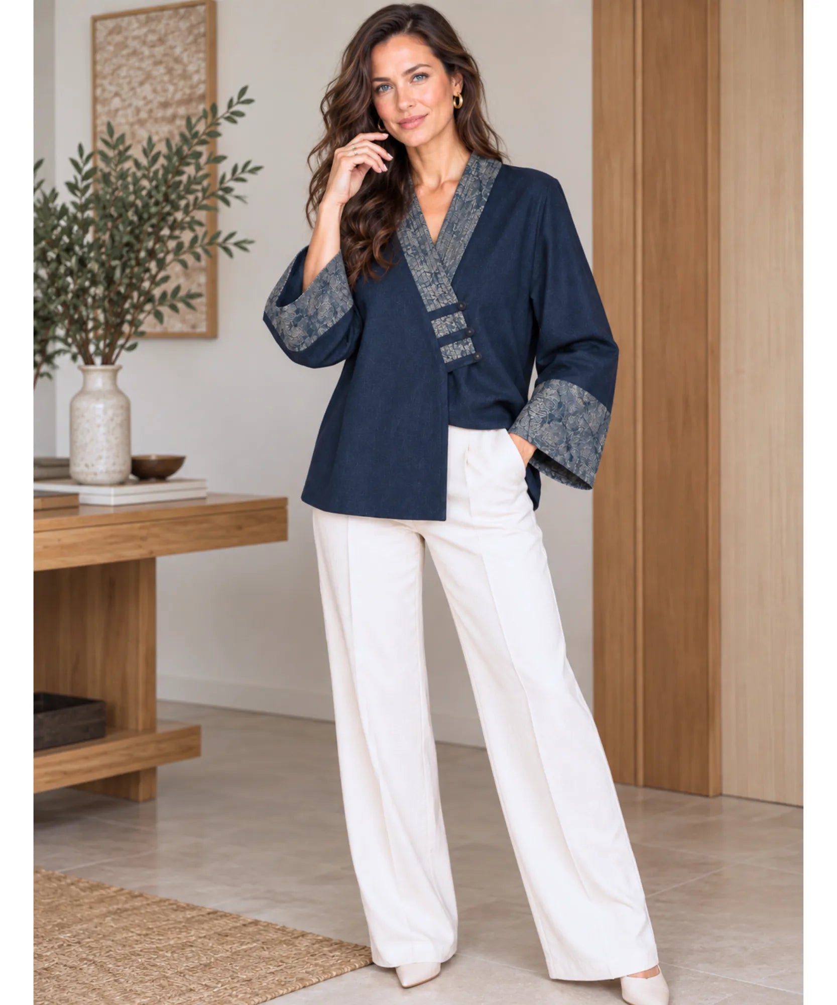 Women's navy denim kimono jacket styled with cream wide-leg pants