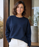 Women's navy fleece lined crew neck sweatshirt, front view
