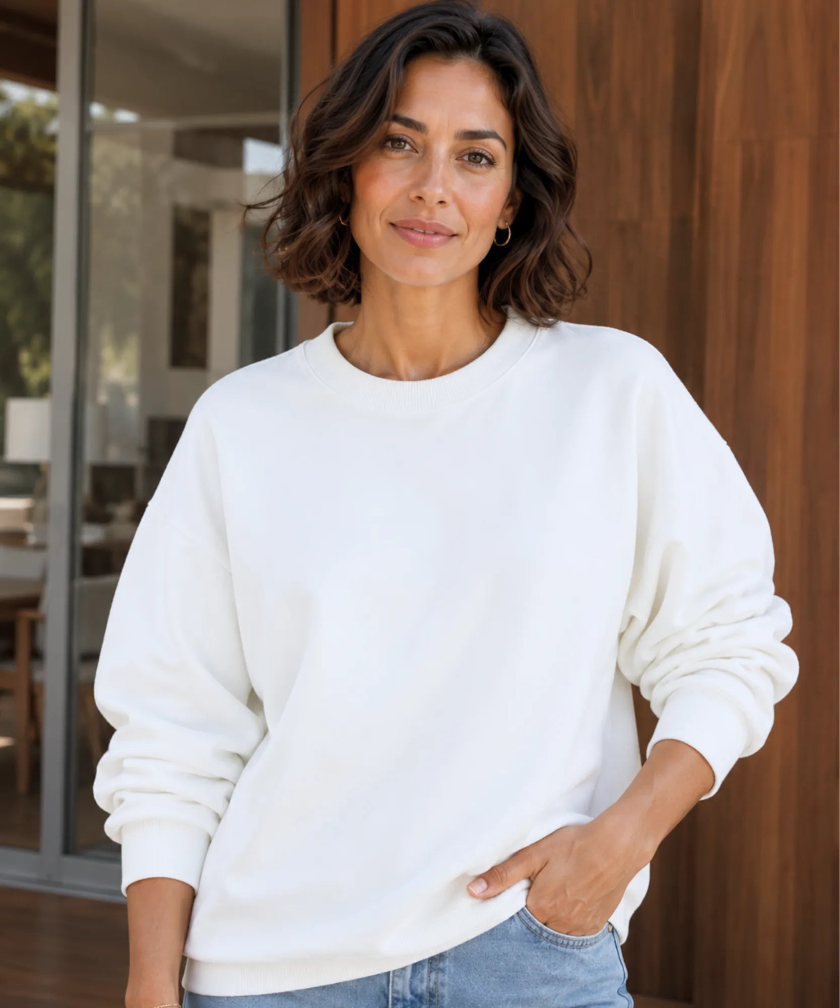 Women's white fleece lined crew neck sweatshirt with relaxed fit