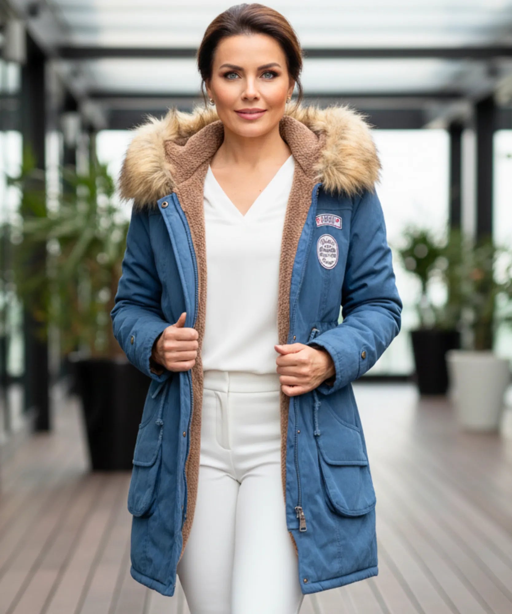 Women's fur hood parka in cobalt blue, front view