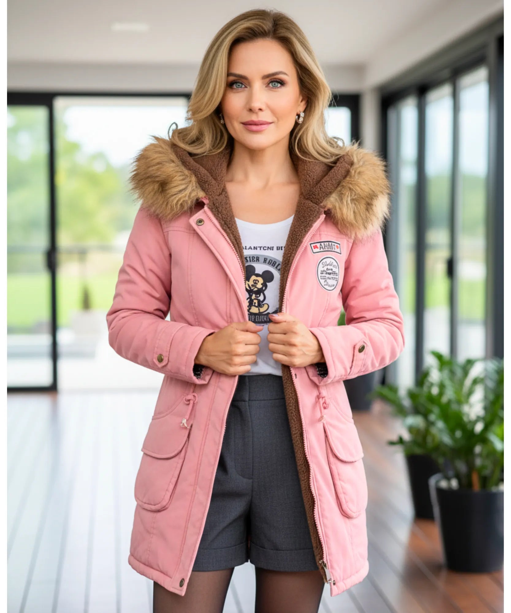 Detail of the waist tie on the blush pink parka