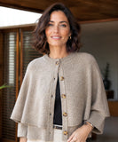 Women's cashmere-soft sweater cape in taupe with button front, front view