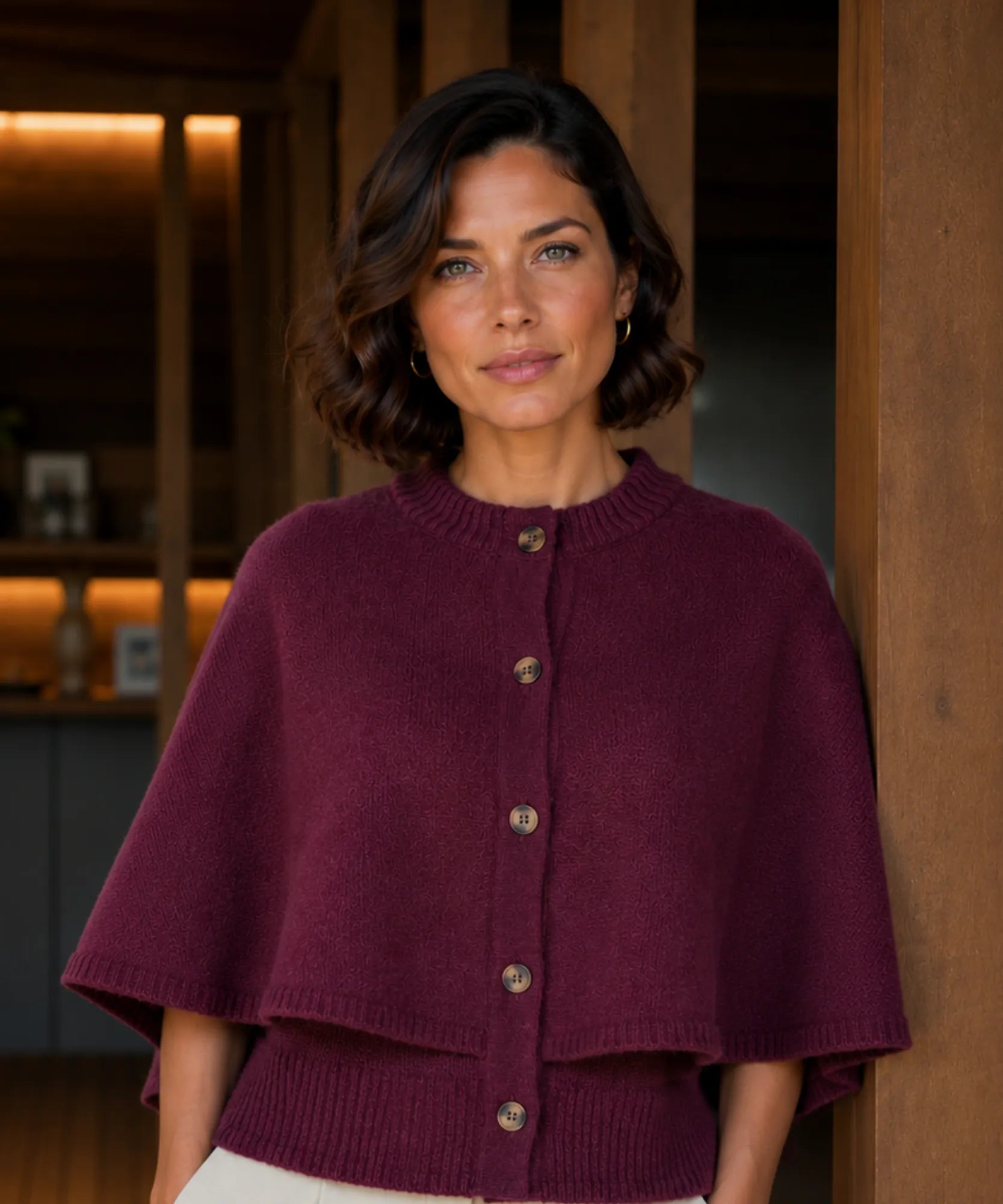 Women's cashmere-soft sweater cape in burgundy, back view