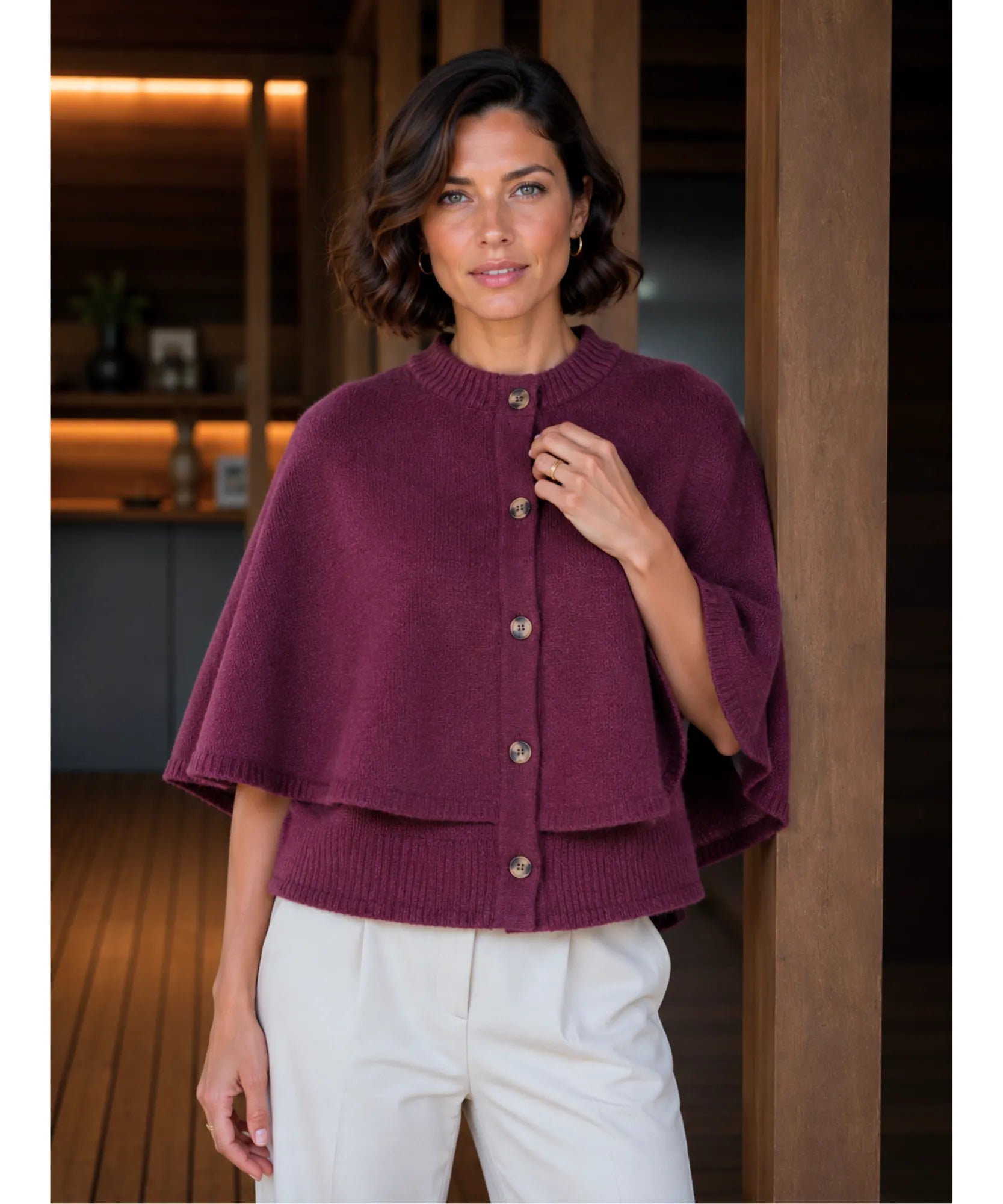 Women's cashmere-soft sweater cape in burgundy, close-up detail