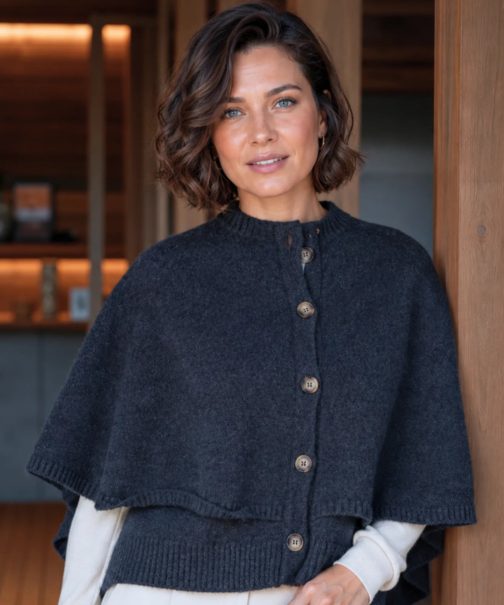 Women's cashmere-soft sweater cape in grey with button front, portrait view