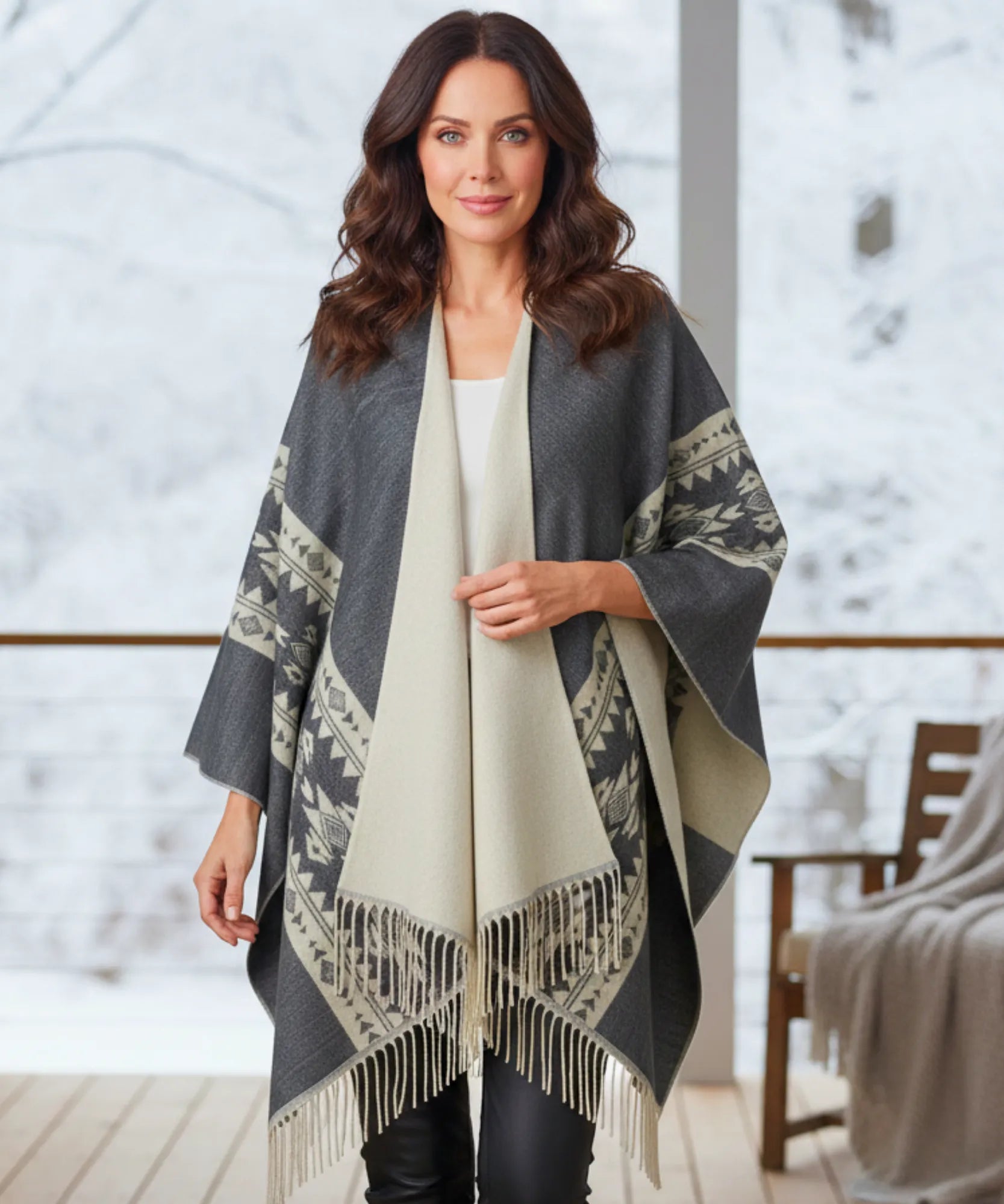 Women's aztec print ruana wrap in black with fringe hem, front view