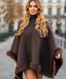 Women's chocolate turtleneck poncho with fur trim, front view
