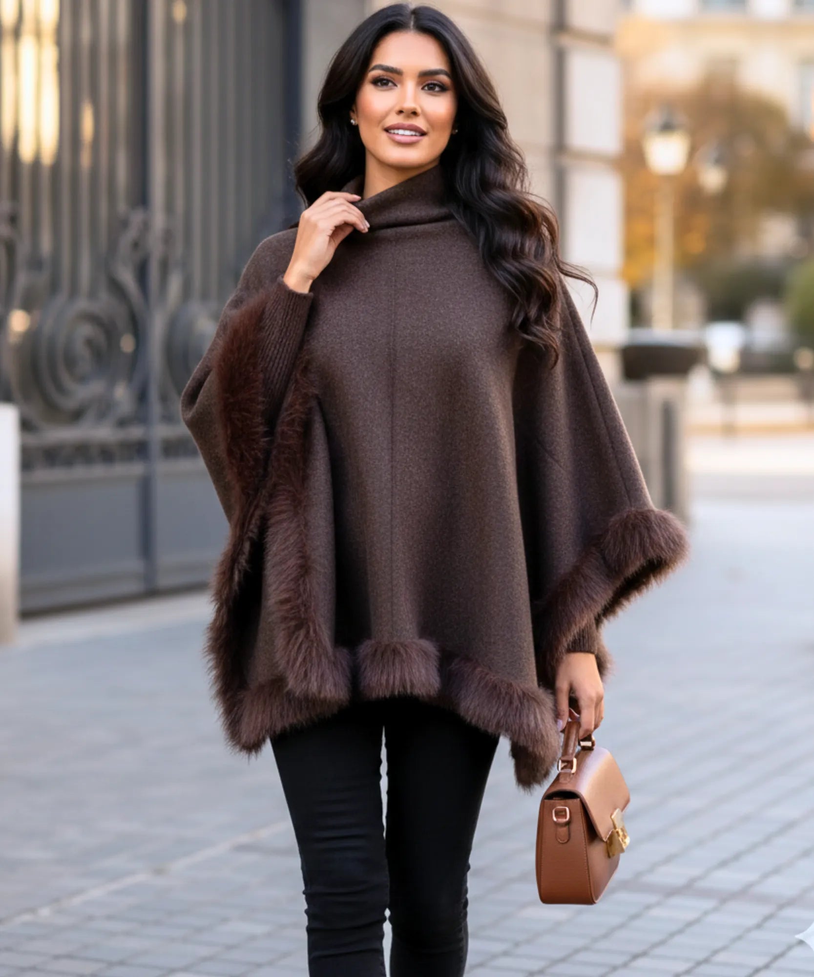 Women's chocolate turtleneck poncho with fur trim, back view