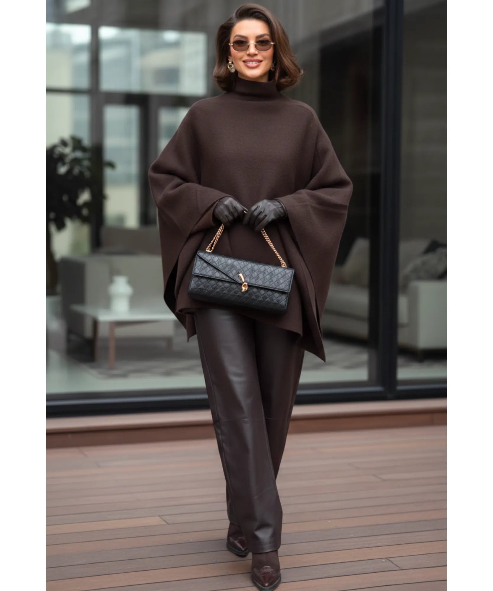 Women's chocolate brown mock-neck sweater poncho, close-up view