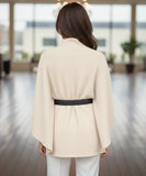 Women's ivory mock-neck sweater poncho, styled look