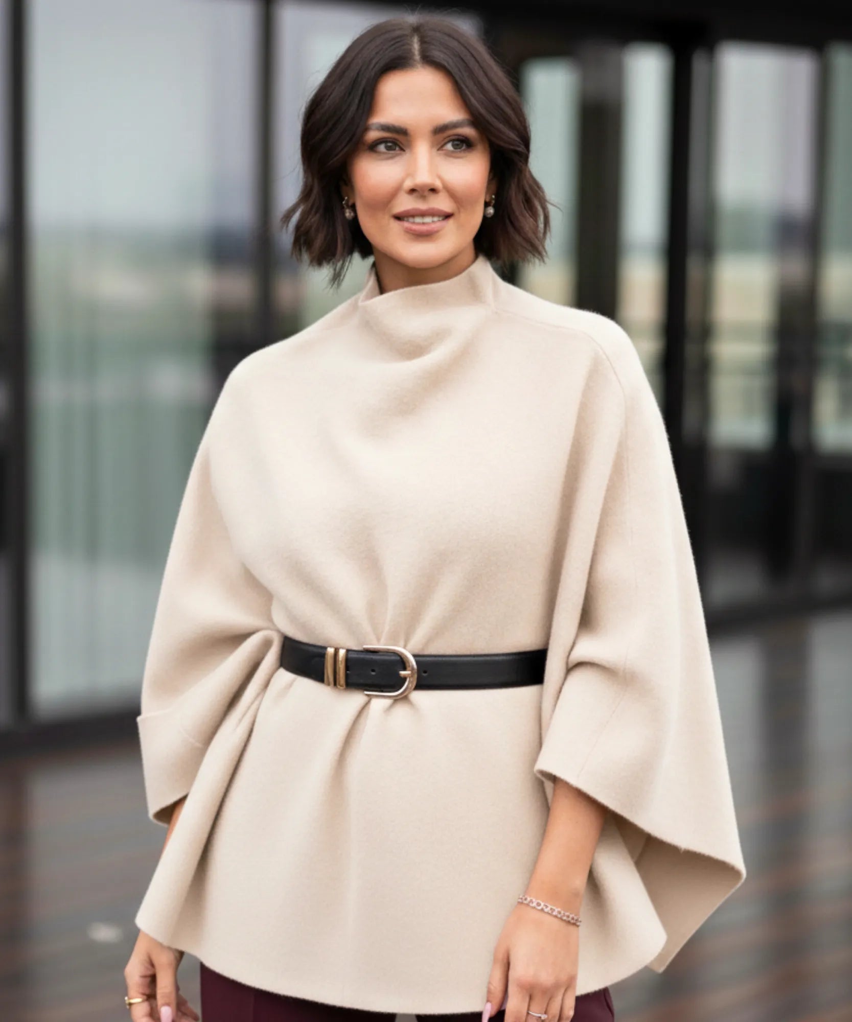 Women's ivory mock-neck sweater poncho, detail view