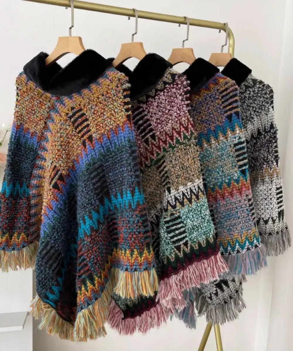 Women's boho poncho sweaters in rainbow, burgundy, beige, and black and grey chunky knit with fur-trim collars