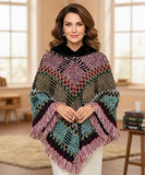Women's boho poncho sweater in burgundy multicolor chunky knit with fur-trim collar and fringe hem