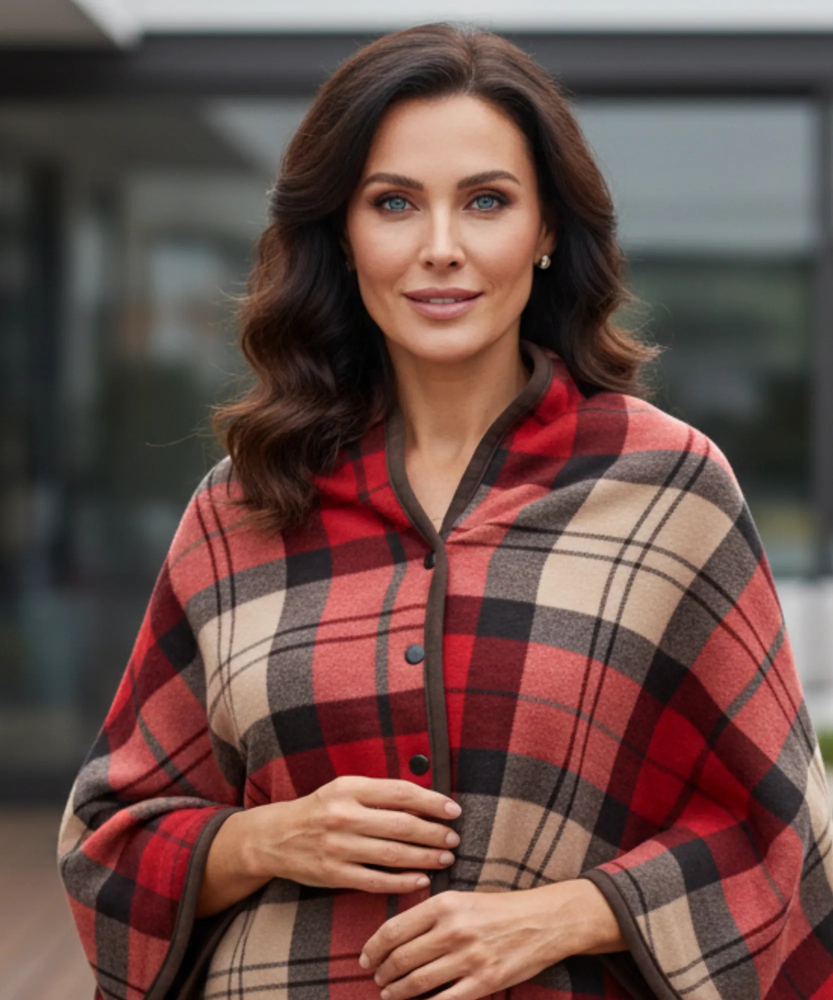 Women's plaid blanket poncho in red plaid with button front