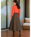 Women's brown plaid button-front midi skirt, side view