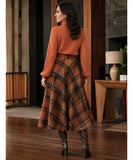 Women's terracotta wool plaid midi skirt, side view