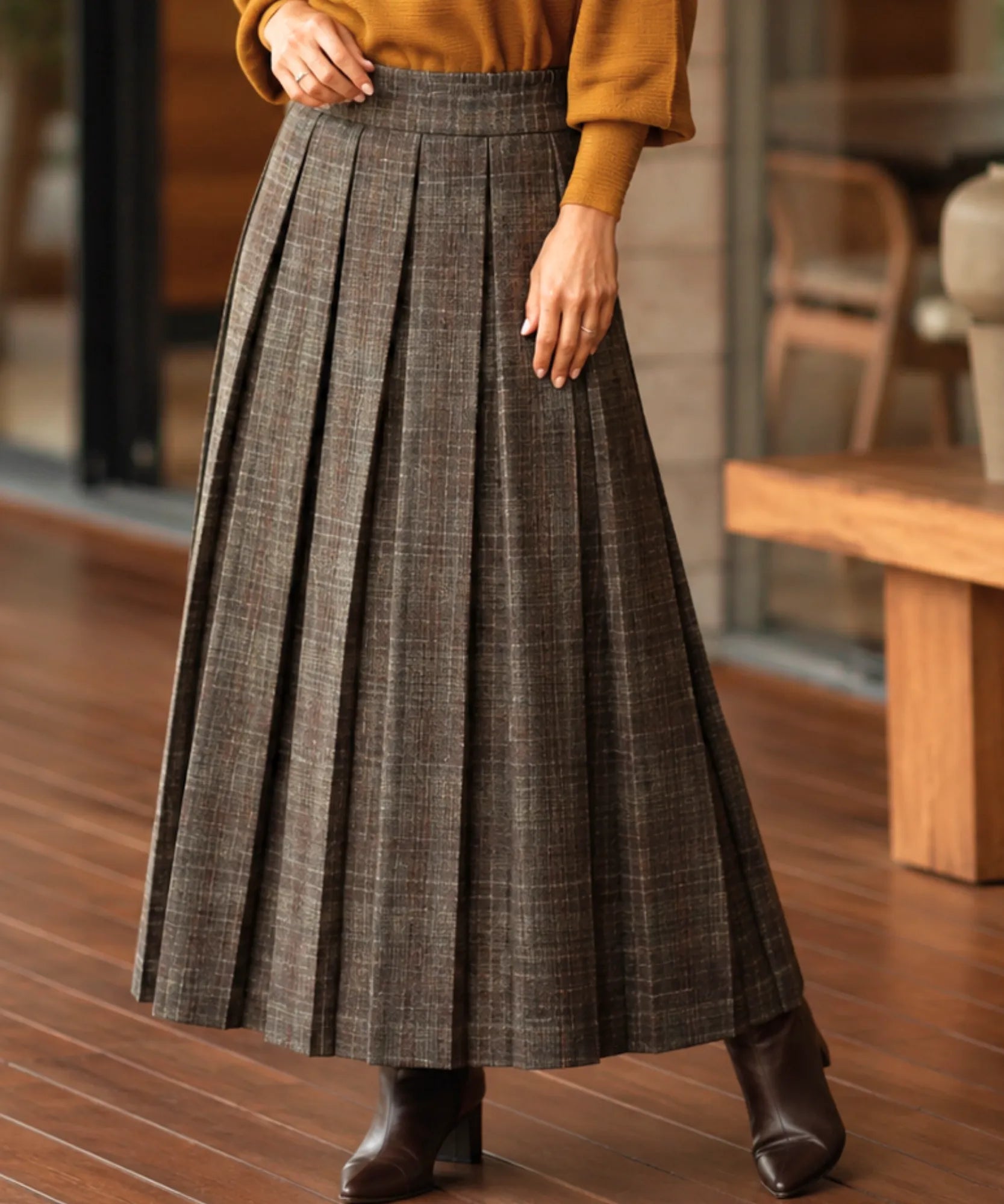 Women's brown plaid pleated wool midi skirt, front view