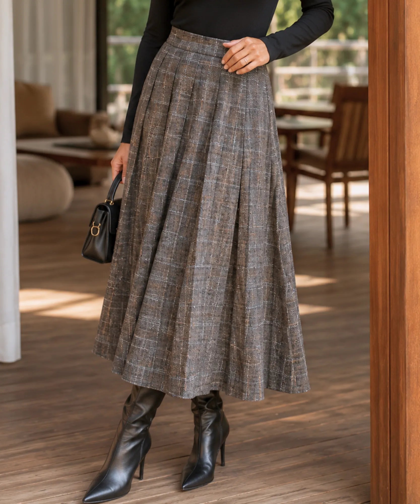 Women's brown plaid pleated wool midi skirt, fabric and pleat detail