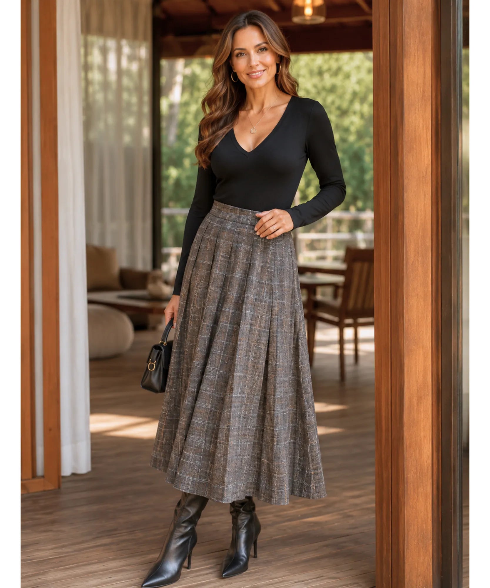 Women's brown plaid pleated wool midi skirt styled with blazer