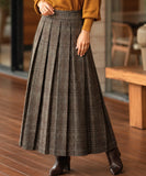 Women's brown plaid pleated wool midi skirt, front view