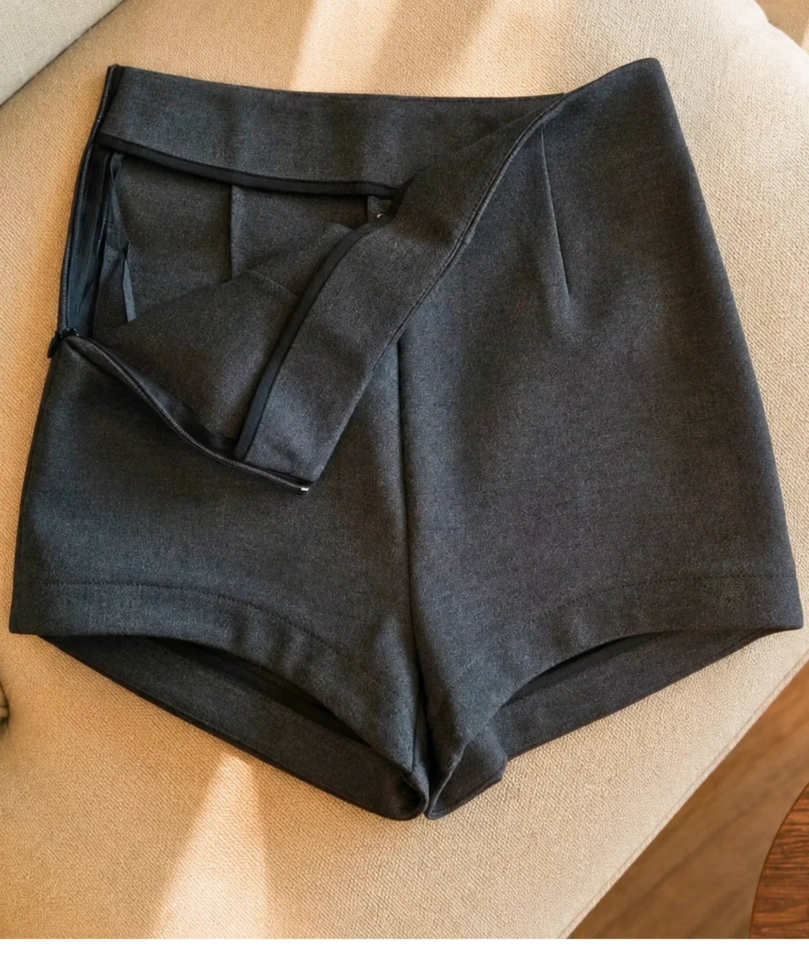 Women's charcoal tailored shorts flat lay