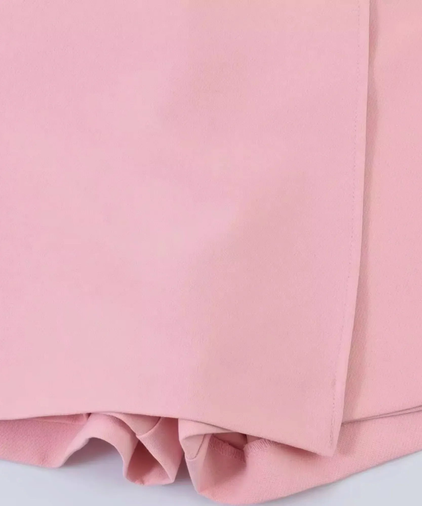 Women's pink wrap skort polyester fabric close up