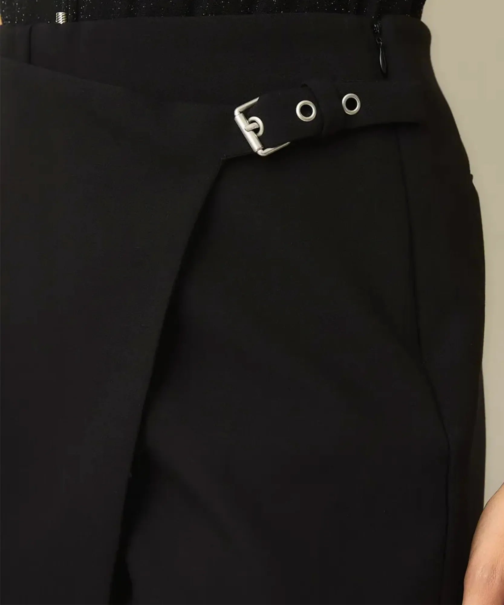 Women's black wrap skort close up of the side buckle