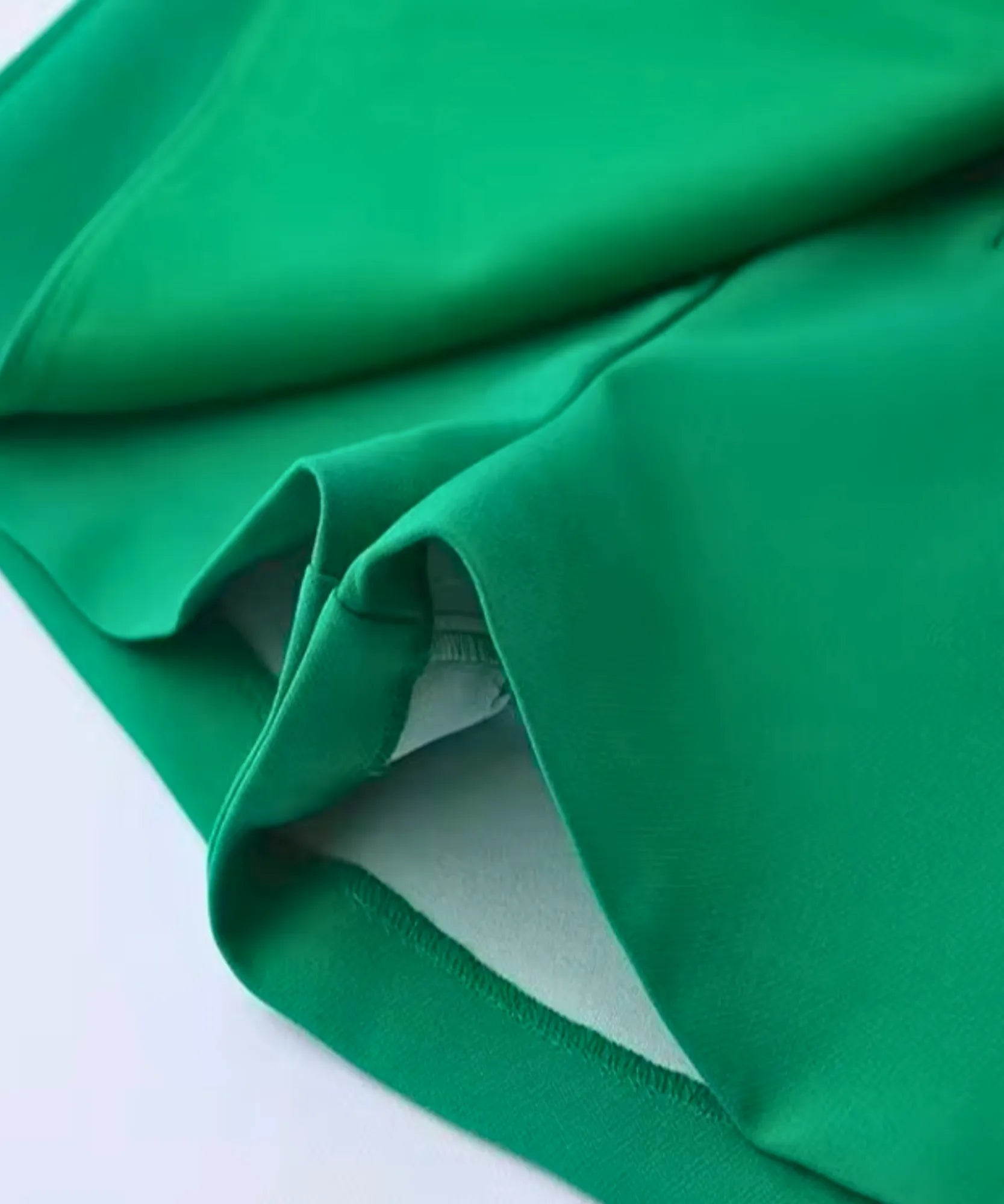 Women's emerald green wrap skort fabric and finish close up
