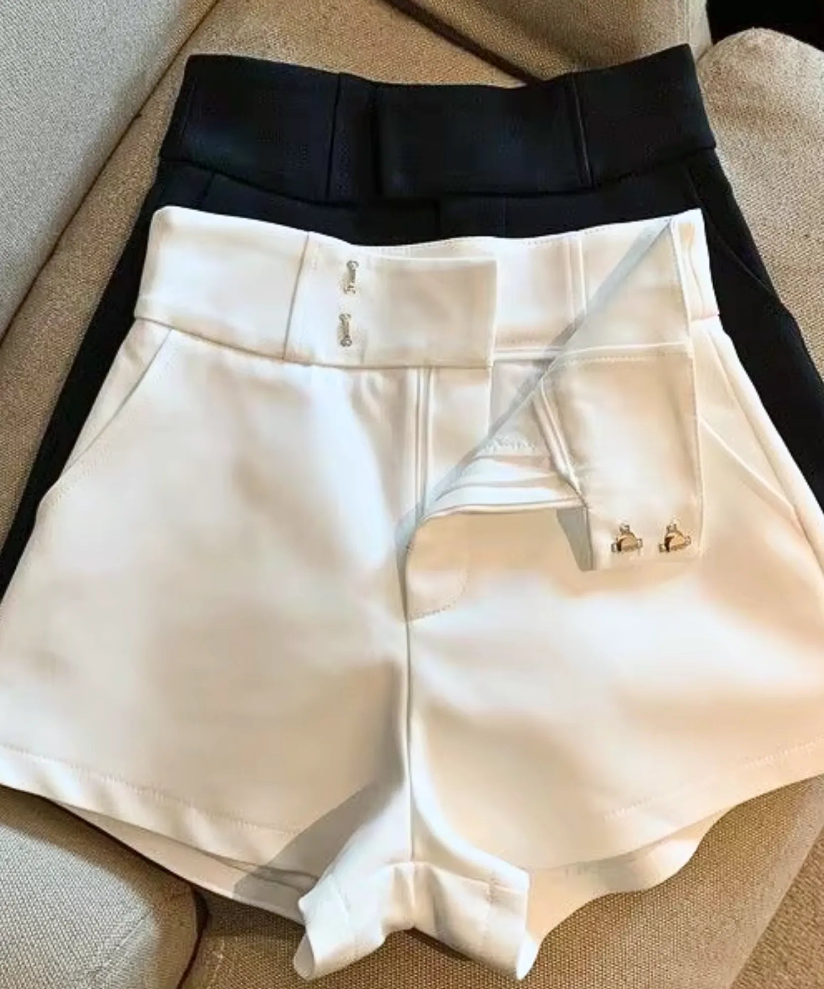 Women's white high waisted dress shorts with wide waistband