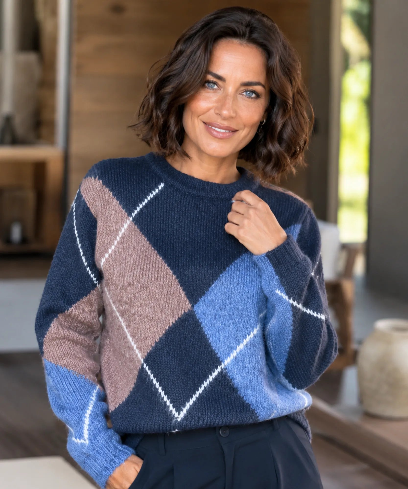 Women's Argyle Crew Neck Sweater in Blue, close-up of the diamond print