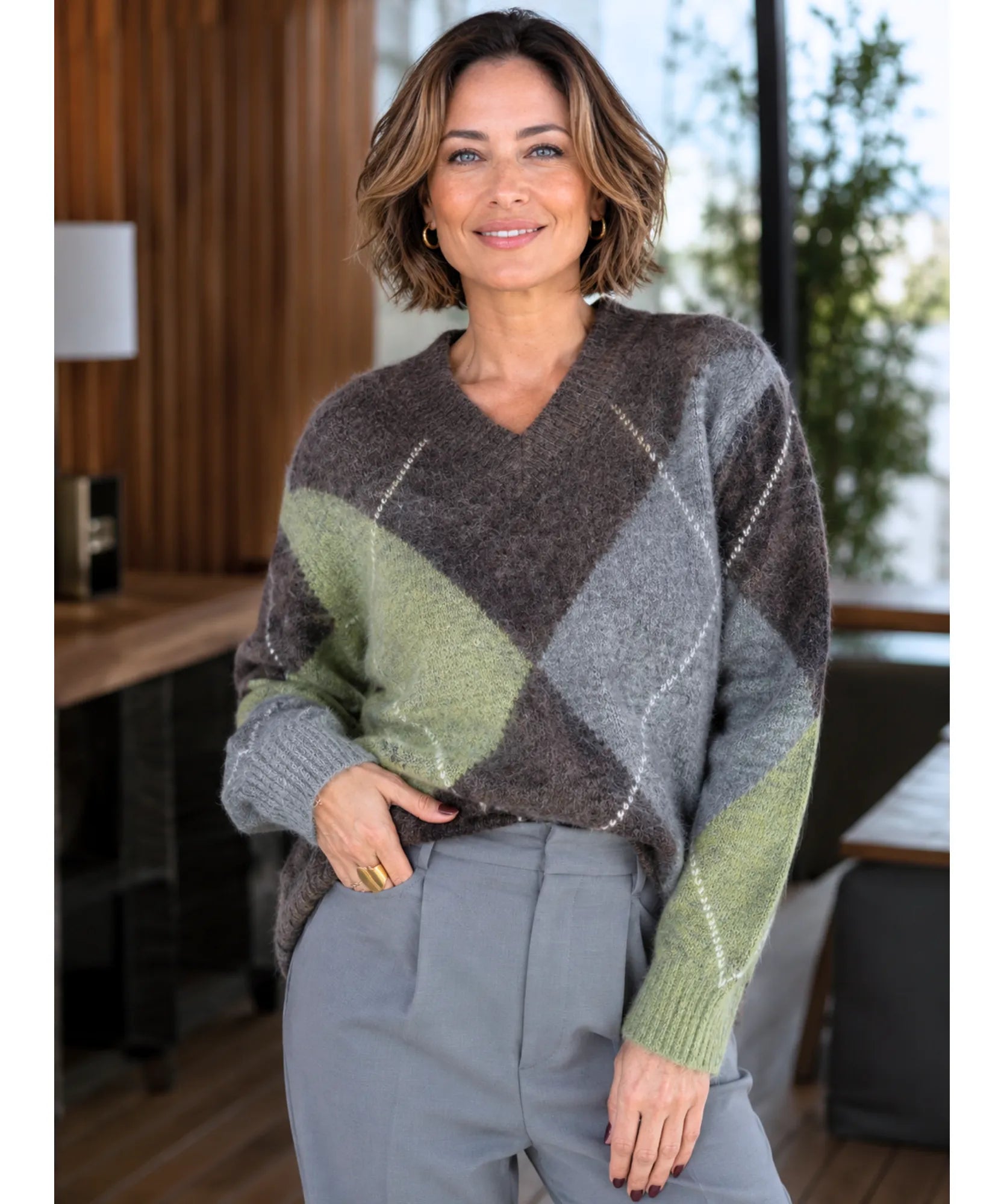 Women's Argyle V-Neck Sweater in Sage Green, lifestyle shot