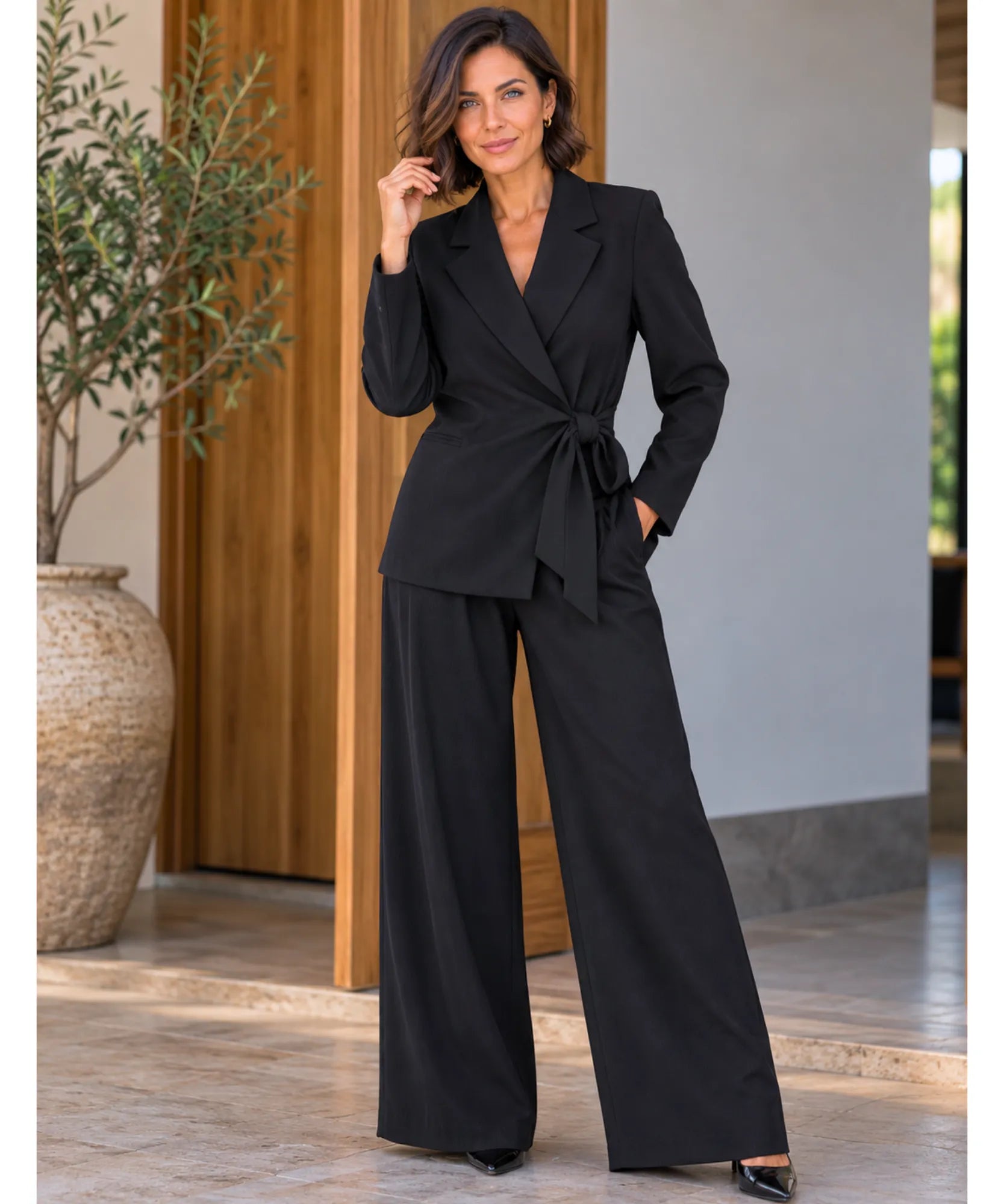 Black pantsuit set with high-waisted wide leg pants, full length look