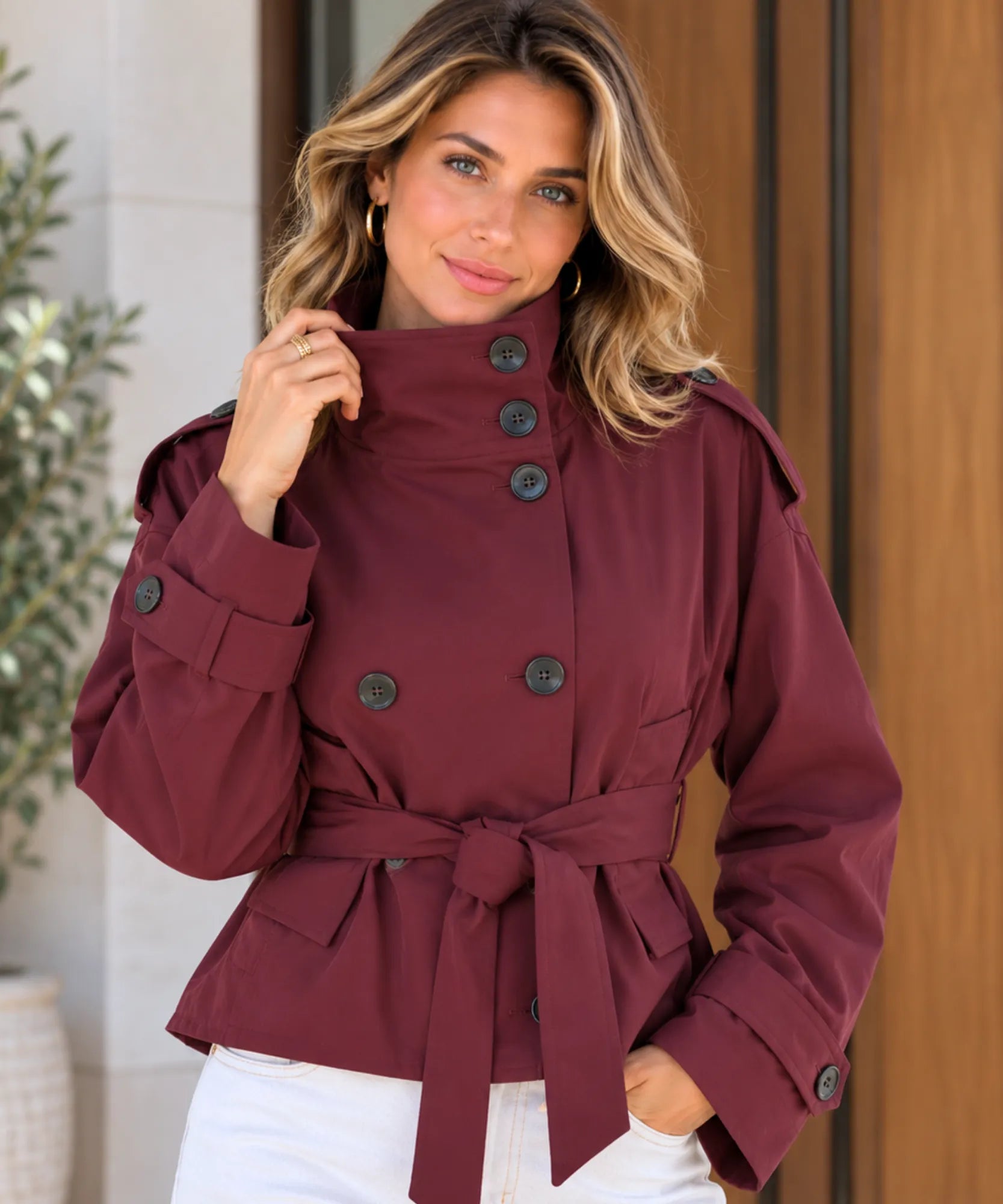 Women's short trench coat in burgundy with funnel neck and tie belt