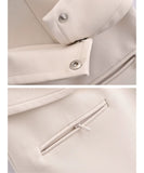 Women's tailored sheath dress in ivory, back view