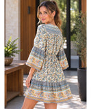 Ivory paisley print boho mini dress, back view