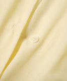 Butter yellow mini shirt dress, button and cuff detail