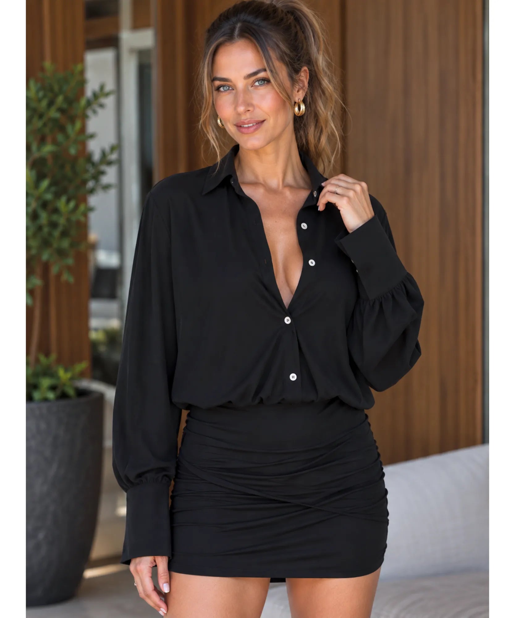 Black mini shirt dress with long sleeves, front view