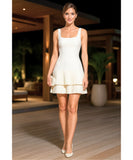 Women's tiered ruffle mini dress in white, back view