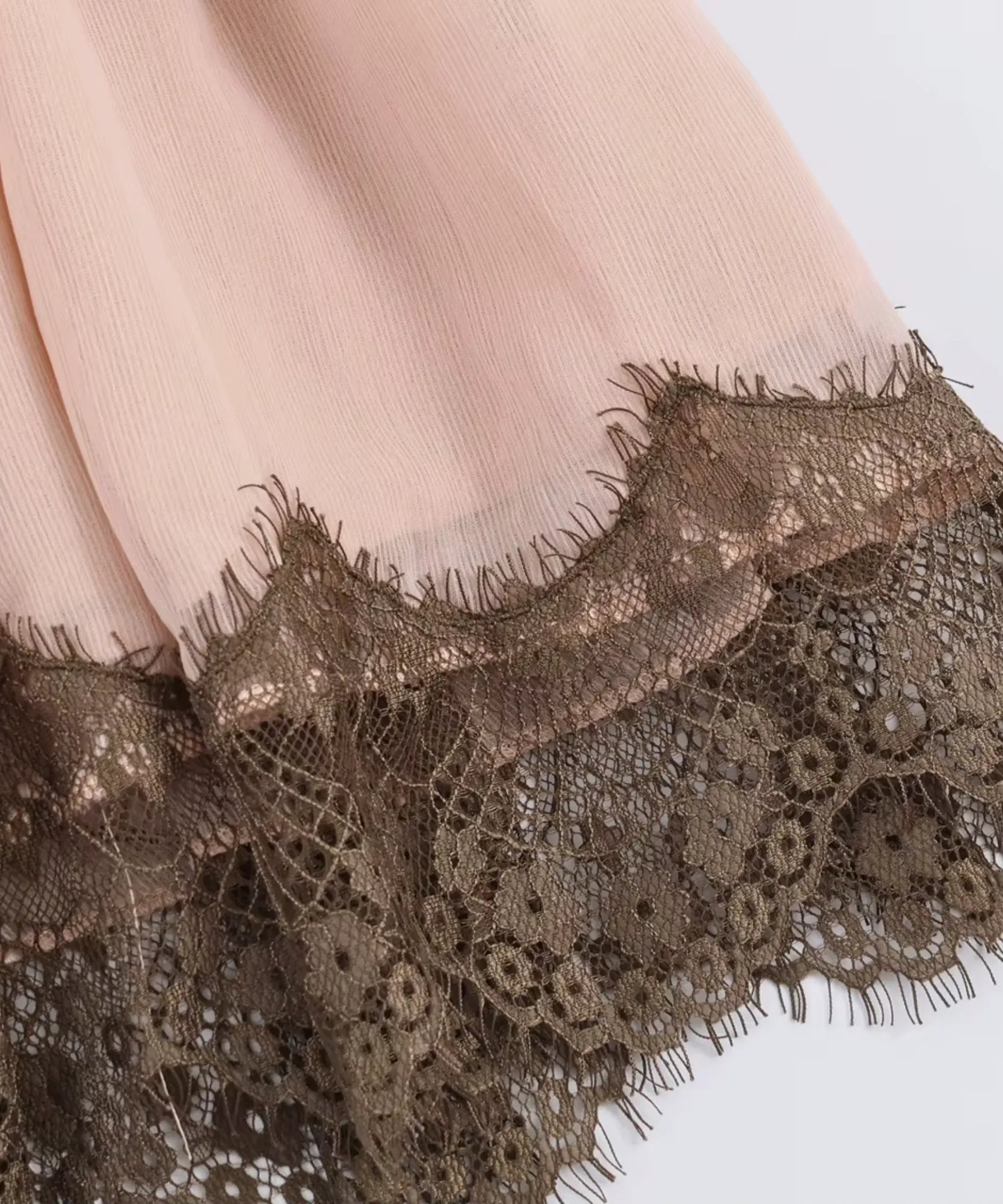 Pink lace trim mini dress, neckline and strap detail