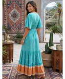 Turquoise boho maxi dress, back view with V-neck