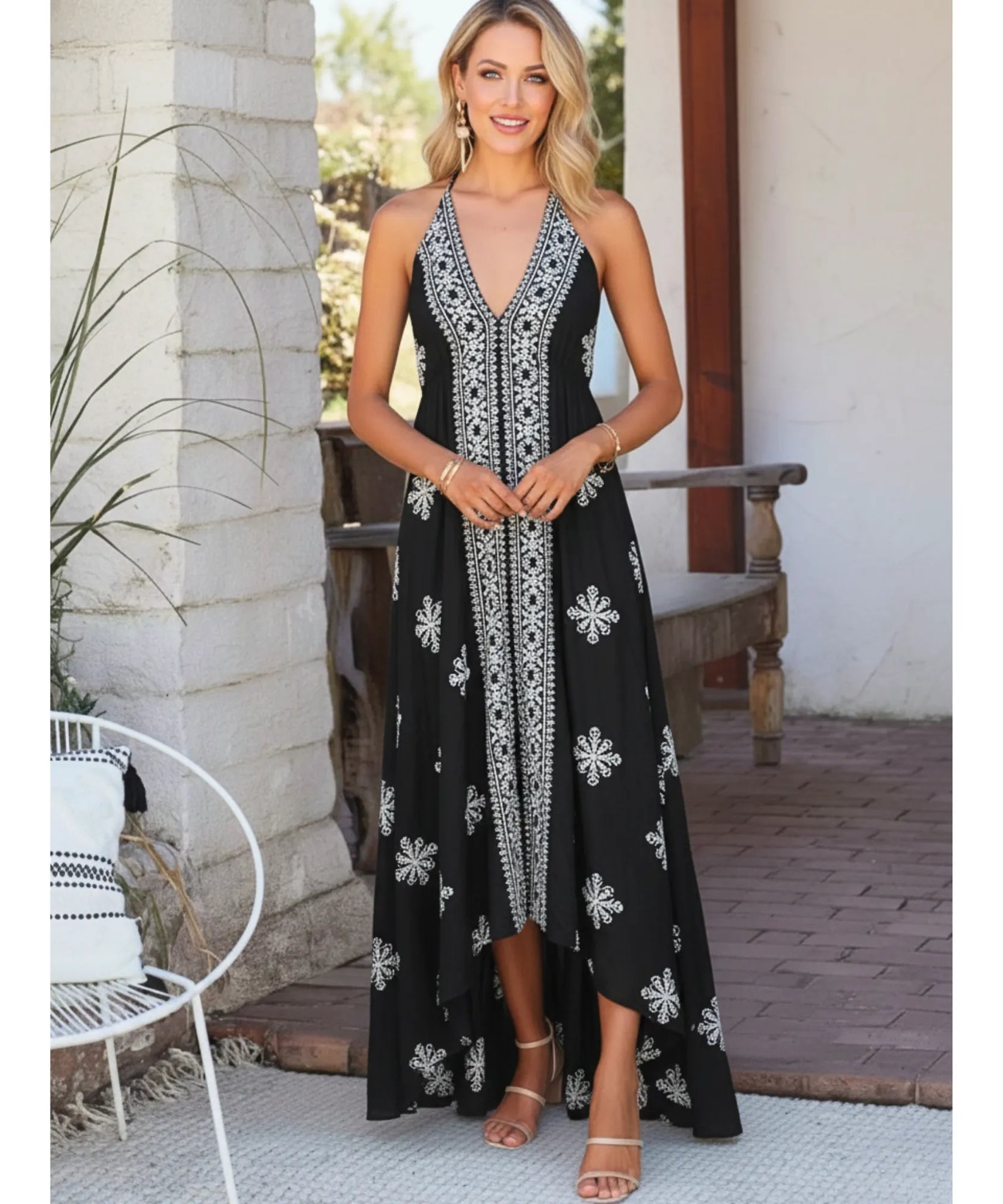 Women's boho halter maxi dress in black print, back view