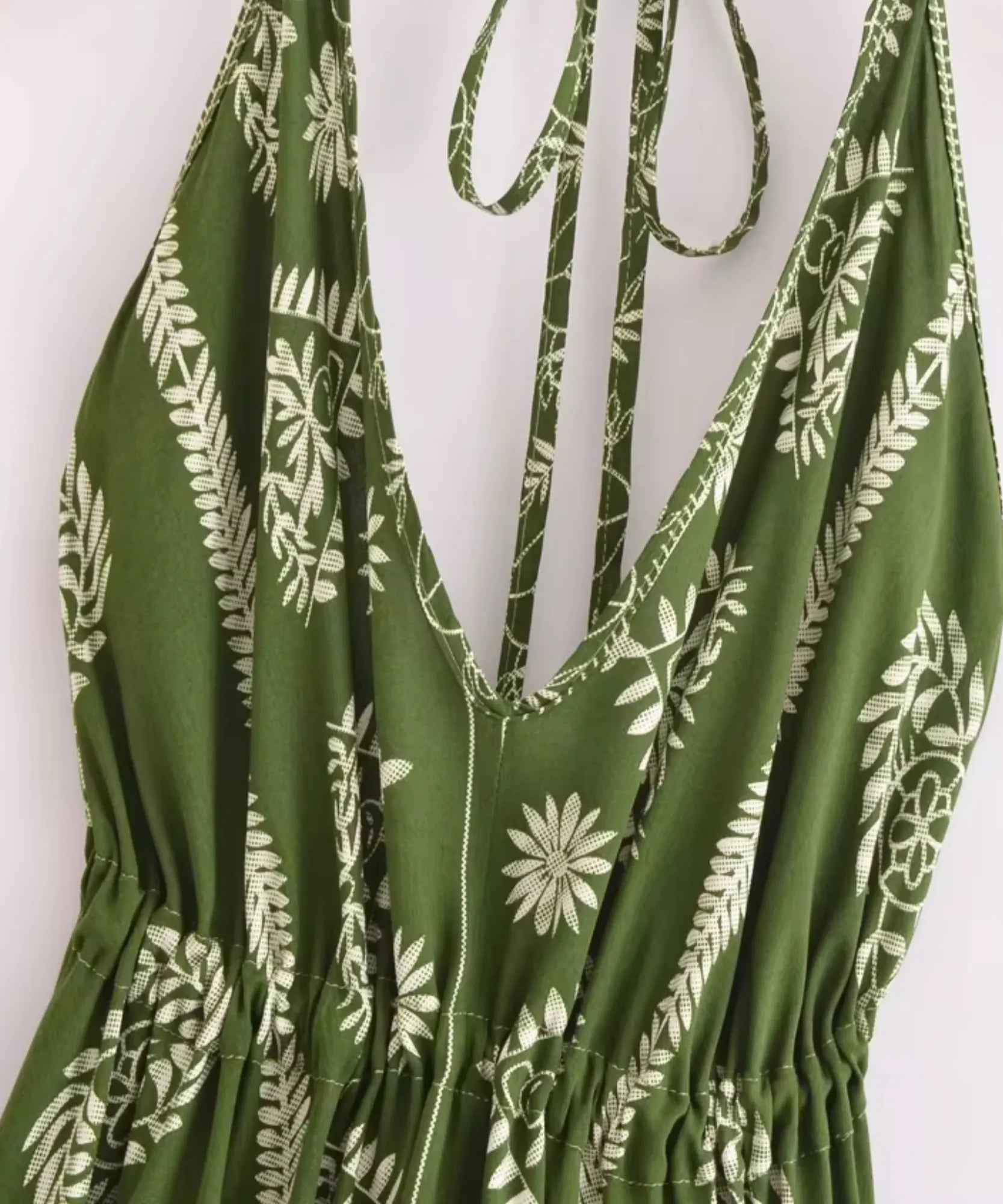 Women's boho halter maxi dress in green print, detail view