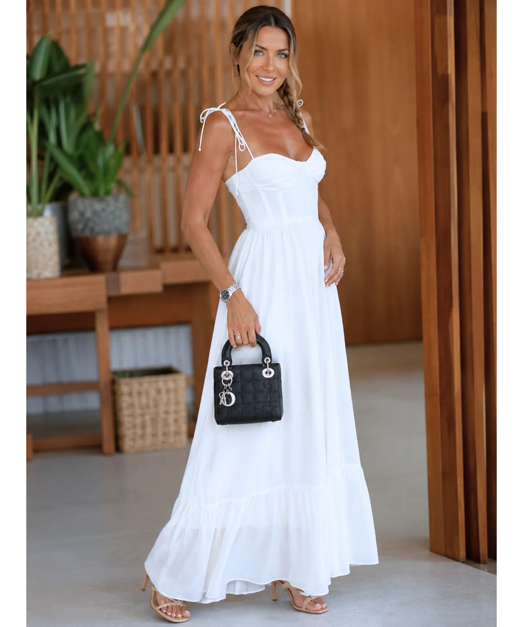White bustier maxi dress with ruffle hem, styled look