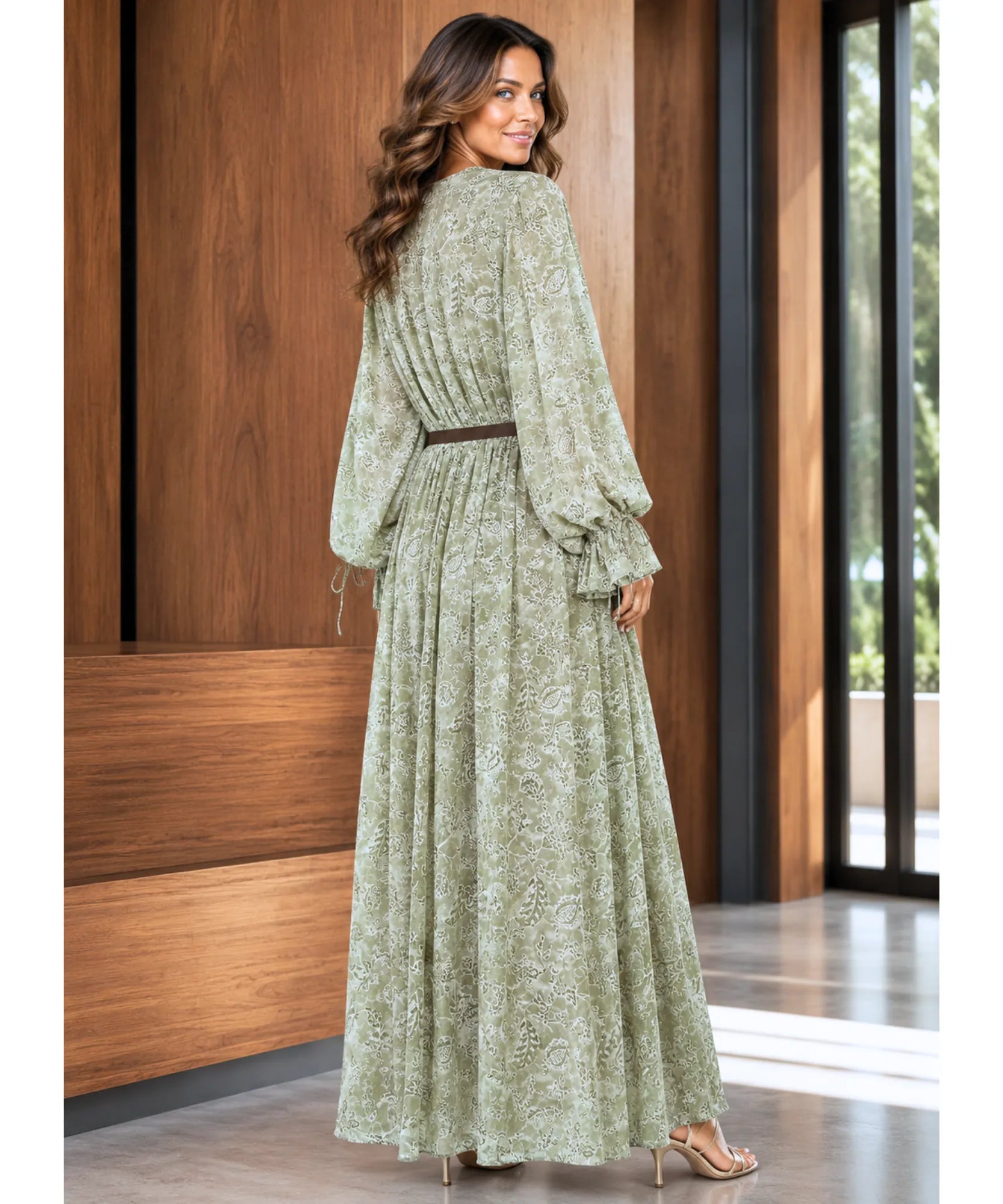Sage green floral maxi dress, back view with flowing skirt